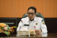 Kepala Dinas Komunikasi Informasi dan Statistik Riau, Ikhwan Ridwan