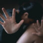 Stop violence and rape concept,concept photo of sexual assault,traumatized young girl