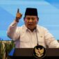 Indonesias President Prabowo Subianto speaks during the launch of a new system for directly transferring allowances to regional public school teachers' bank accounts at the Primary and Secondary Education Ministry in Jakarta on March 13, 2025. (Photo by Yasuyoshi CHIBA / AFP)